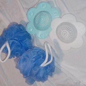 2 Bath loofas and 2 drain hair stoppers.